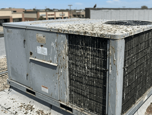 ac unit with bird poop